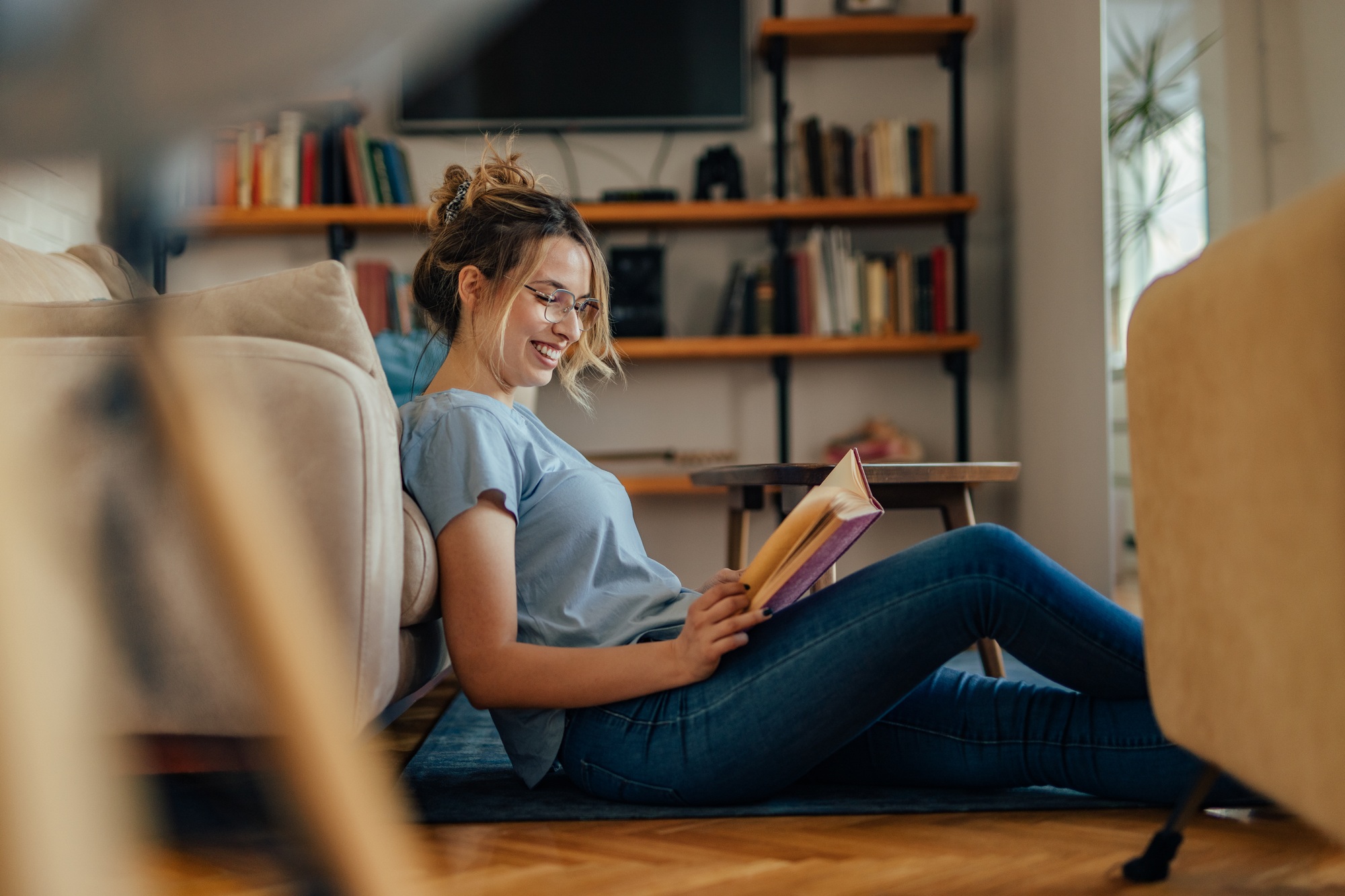 Adult woman, getting into a fantasy book.
